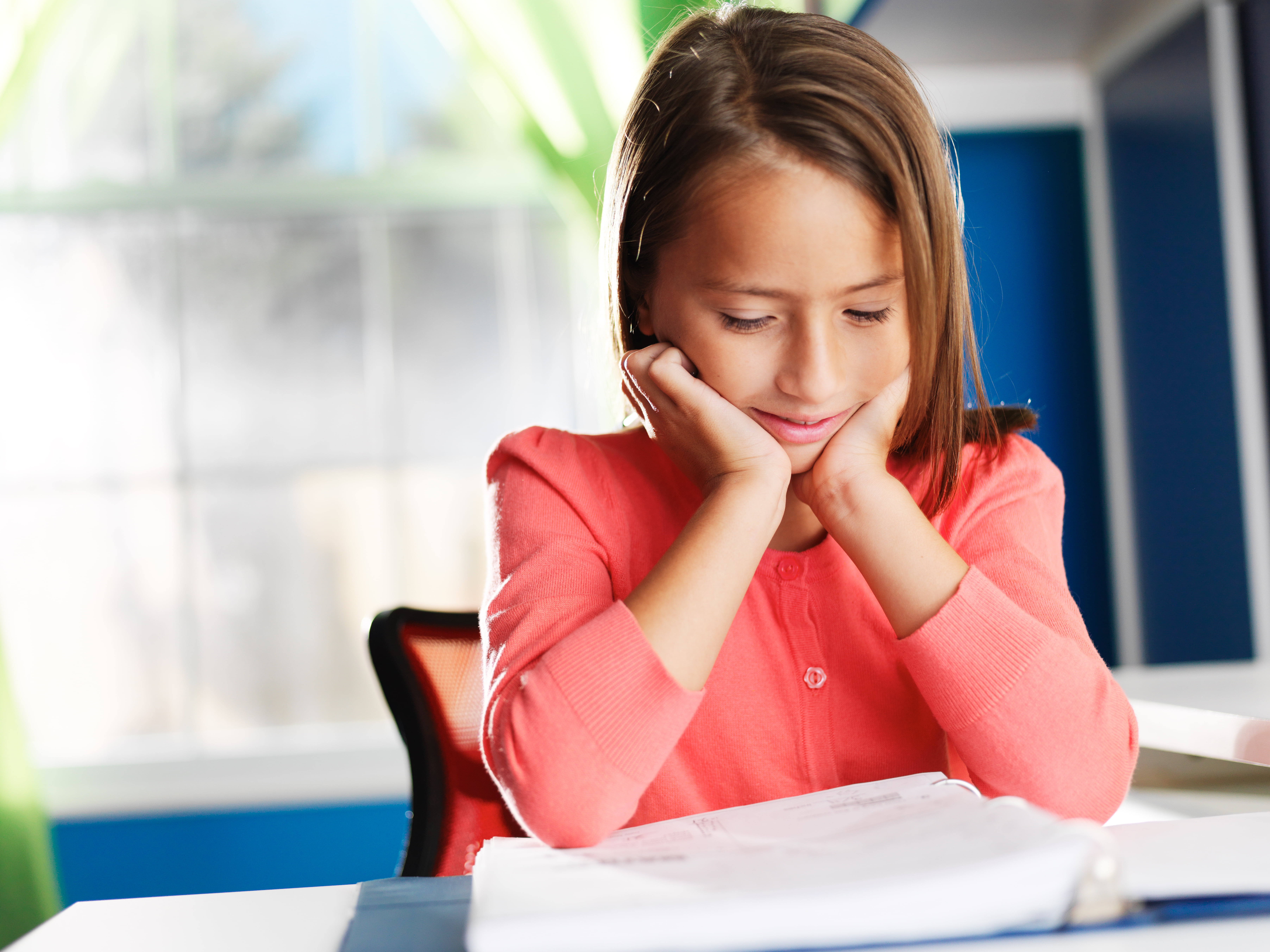 little girl having difficulty with home work