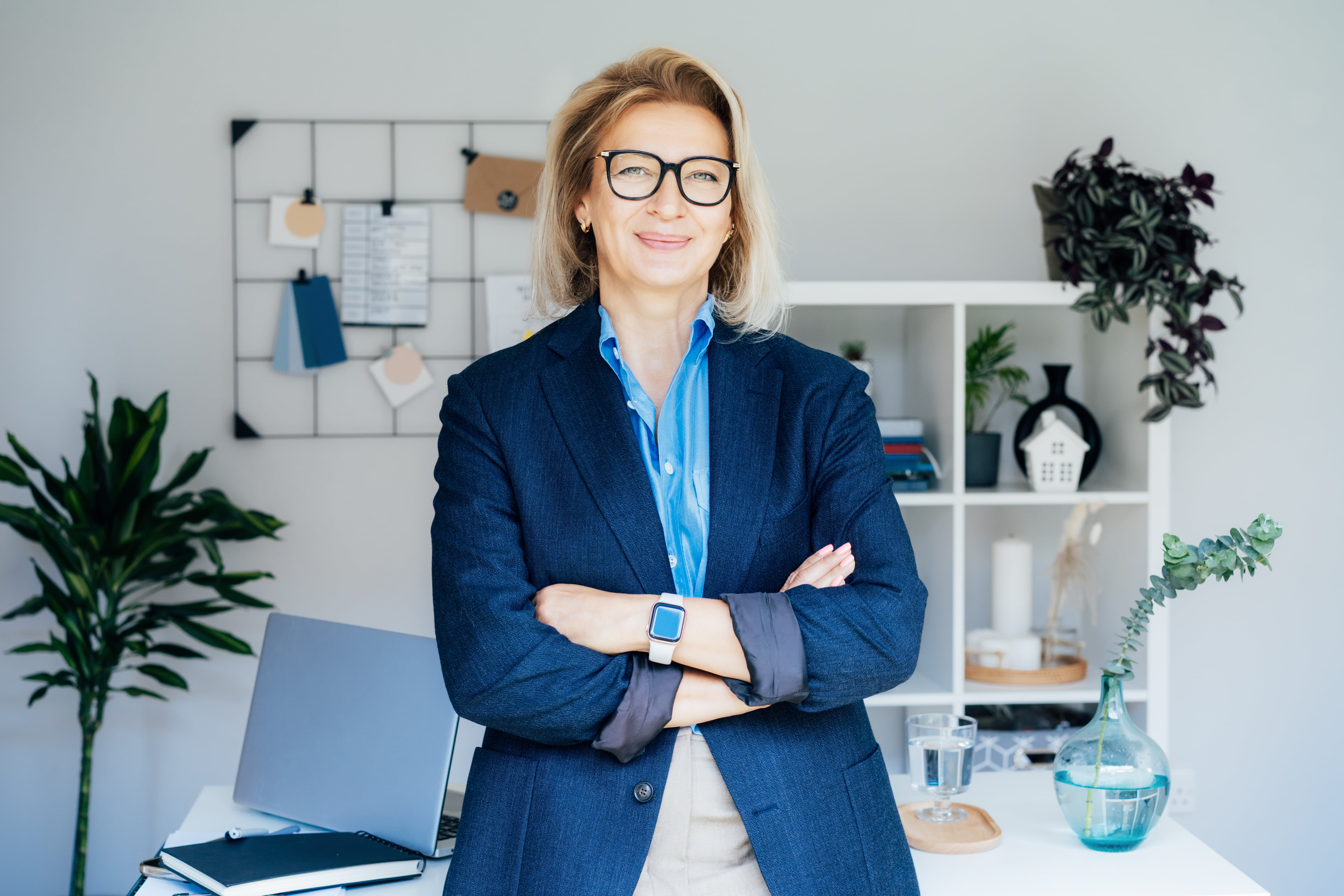 Portrait of smiling 50's stylish, confident mature businesswoman, middle aged company ceo director,